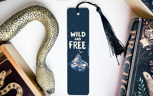 a bookmark with the words wild and free on it