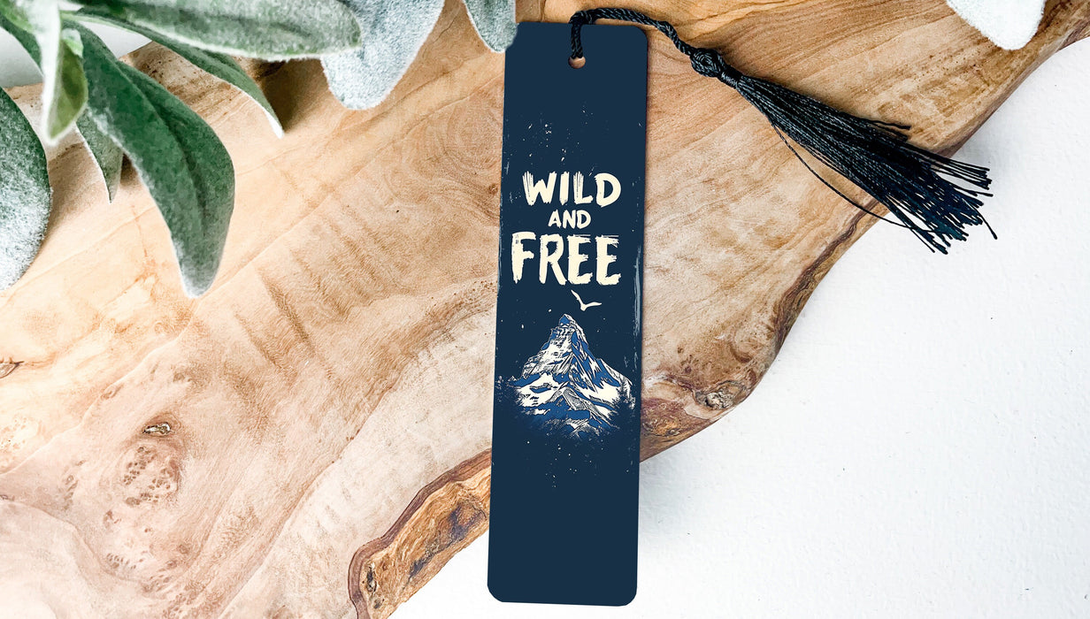 a bookmark with the words wild and free on it