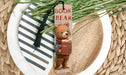 a bookmark with a picture of a bear on it