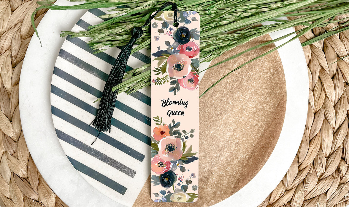 a close up of a plate with a flower bookmark