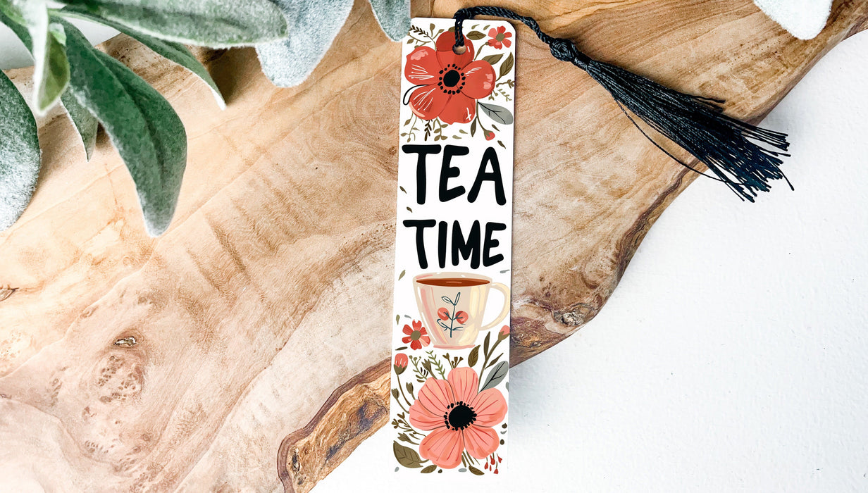 a bookmark that says tea time with flowers on it