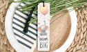 a bookmark with a picture of an elephant on it