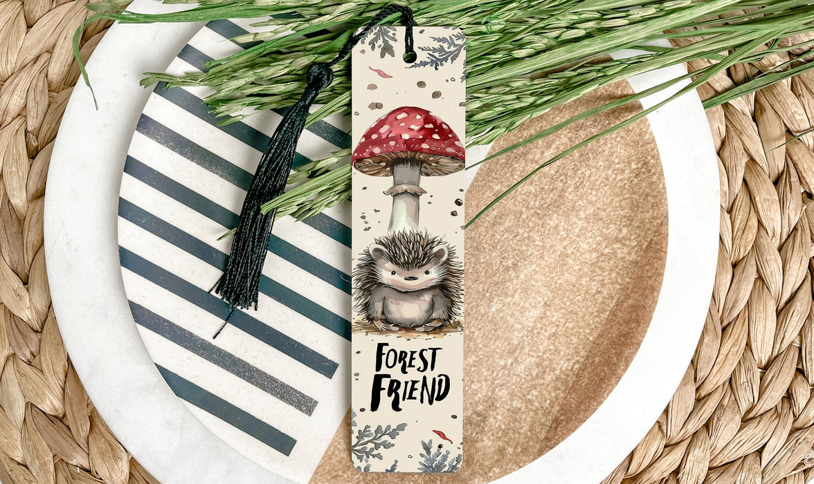 a bookmark with a hedgehog and a mushroom on it