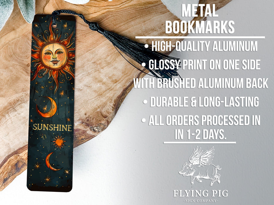 a bookmark with a sun and moon design on it