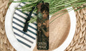 a close up of a bookmark on a plate