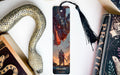 a bookmark with a picture of a dragon on it