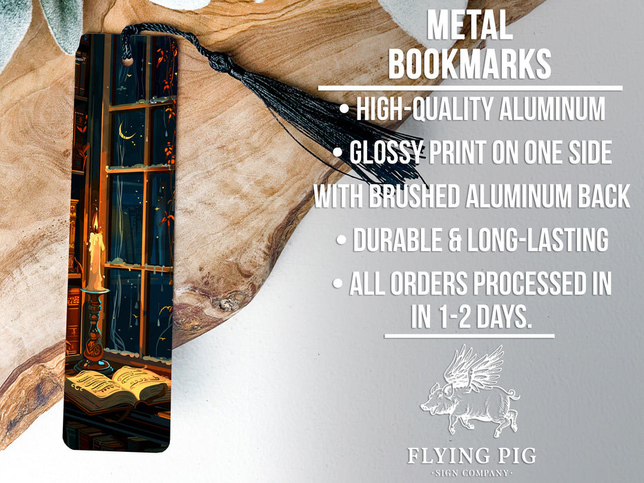 a metal bookmark with a glass - print on one side and a brushed