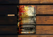 a piece of art sitting on top of a wooden bench