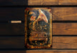 a wooden bench with a decorative sign on it