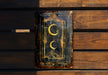 a sign that is on a wooden wall