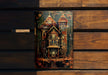 a picture of a house on a wooden wall