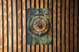 a wooden wall with a picture of a target on it