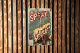 a sign on a wooden wall that says spray cheese
