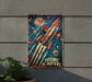 a metal sign that says cosmic blasters on it
