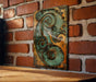 a painting on a brick wall next to a wooden table