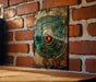 a piece of art on a brick wall