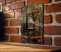a picture of a house on a brick wall