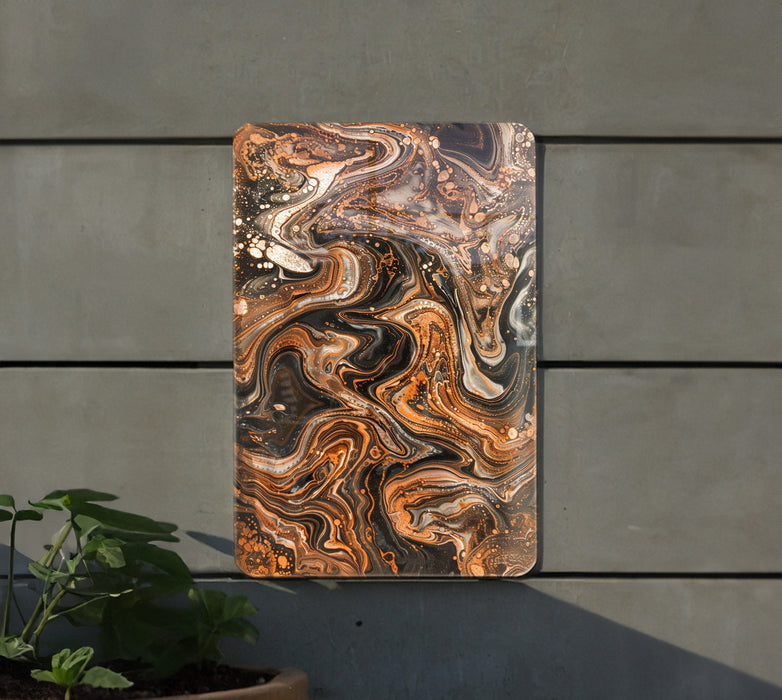 a painting on a wall next to a potted plant