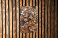 a wooden wall with a painting on it