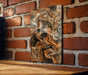 a wooden table sitting in front of a brick wall