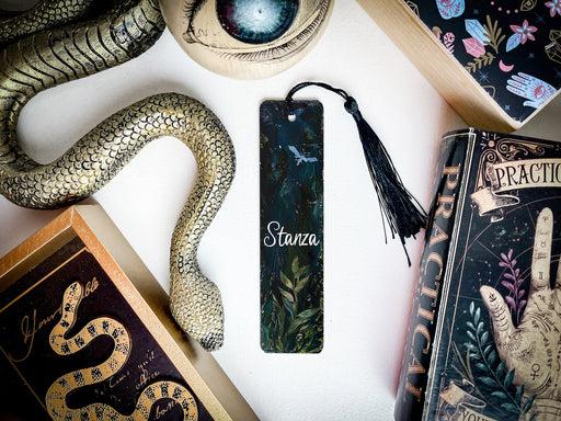 a snake, bookmark, and other items on a table