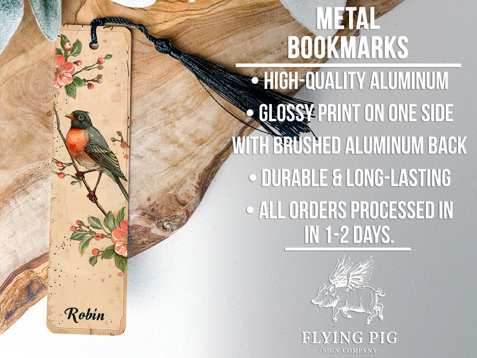 a bookmark with a bird and flowers on it