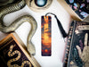 a bookmark with a picture of a snake on it