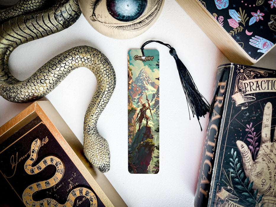 a bookmark, snake, and other items on a table