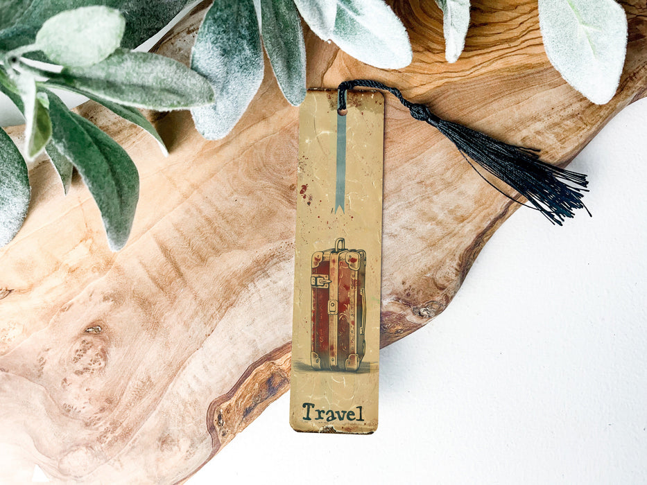a piece of wood with a tassel on top of it