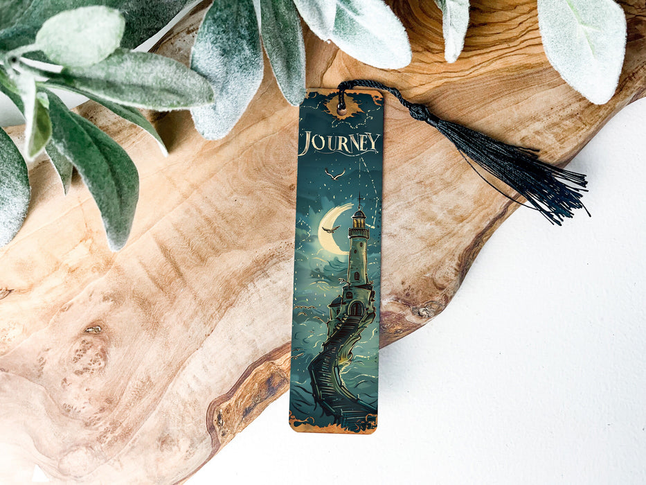a bookmark with a picture of a lighthouse on it