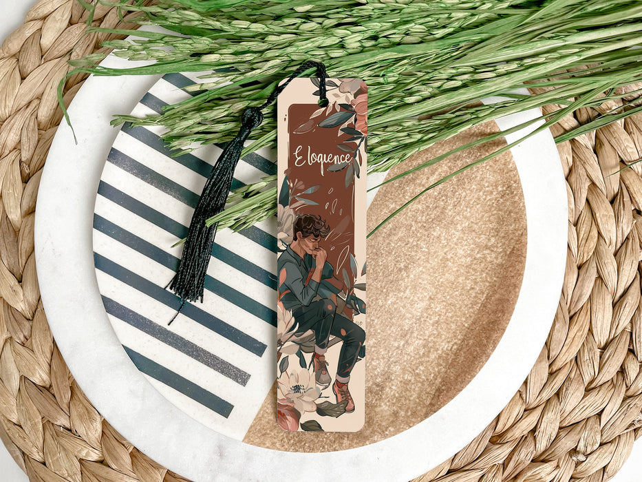 a bookmark with a picture of a boy on it