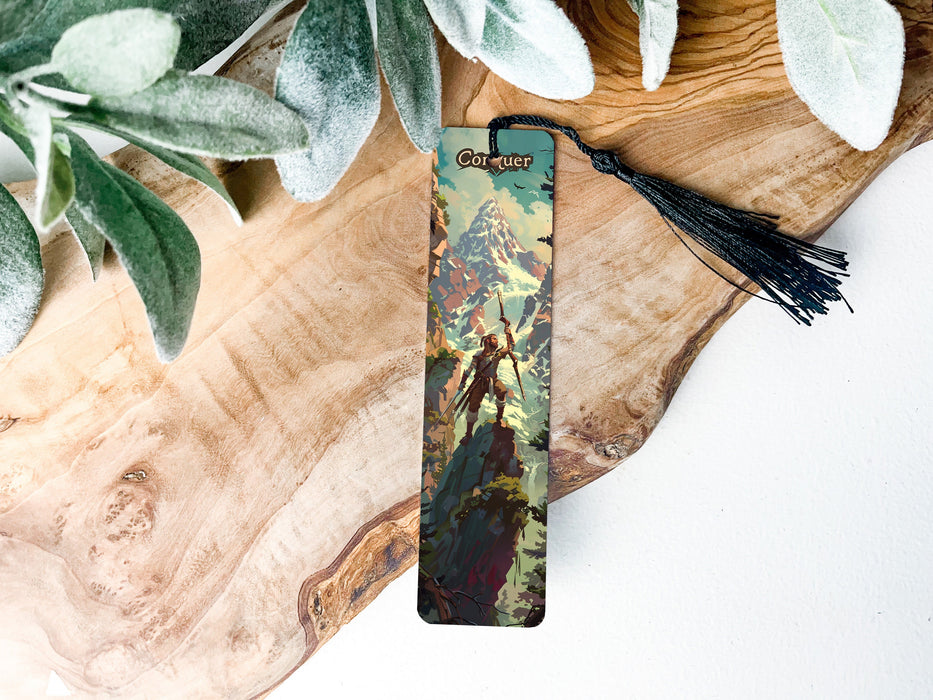 a bookmark with a picture of a forest on it