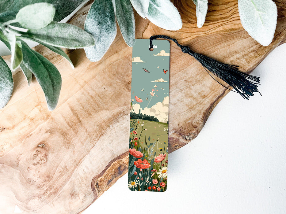 a bookmark with a picture of a field of flowers