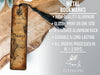a piece of wood with a tassel on top of it