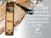a wooden bookmark with a tassel on top of it