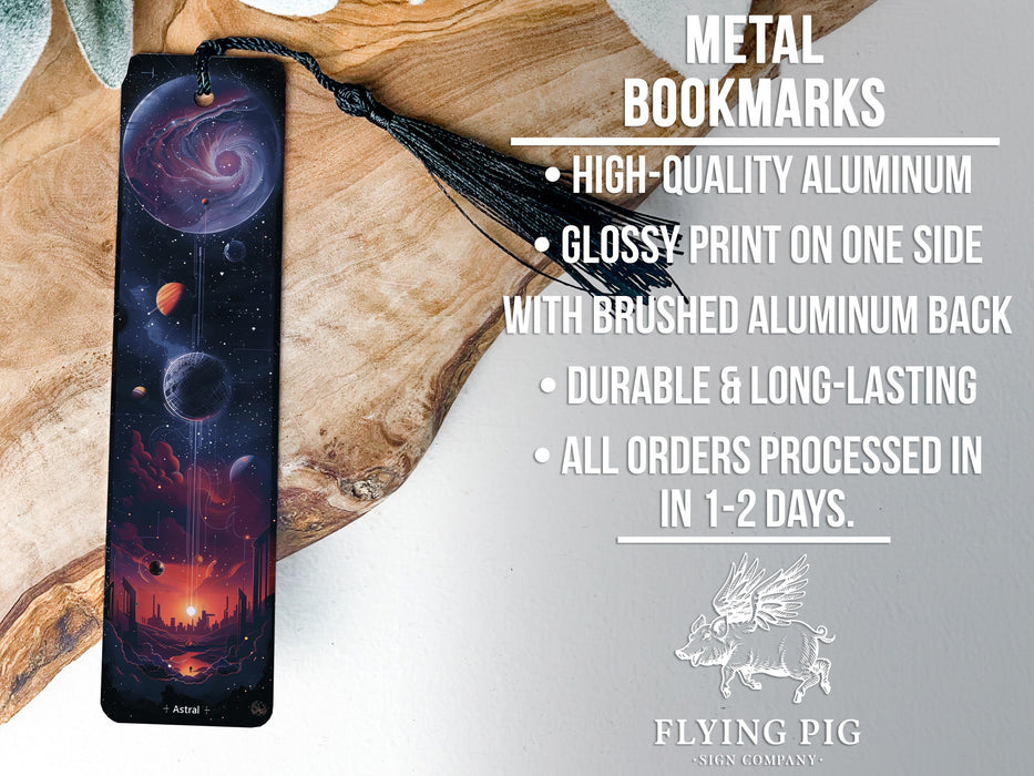 a metal bookmark with a picture of planets on it