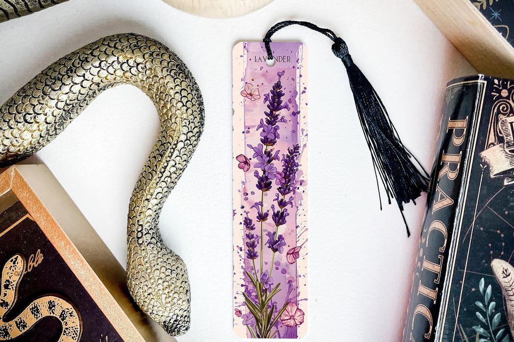 a bookmark, snake, and other items on a table