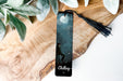a bookmark with a picture of a man on it