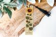 a bookmark with a sunflower design on it