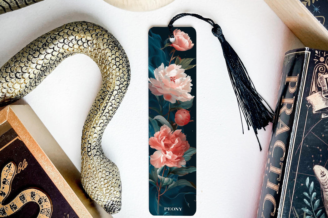a bookmark with flowers and a snake on it