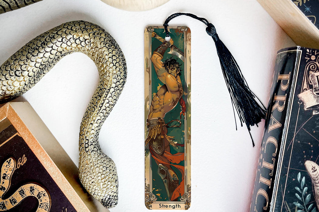 a bookmark with a picture of a woman and a snake on it