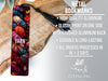 a close up of a bookmark on a piece of wood