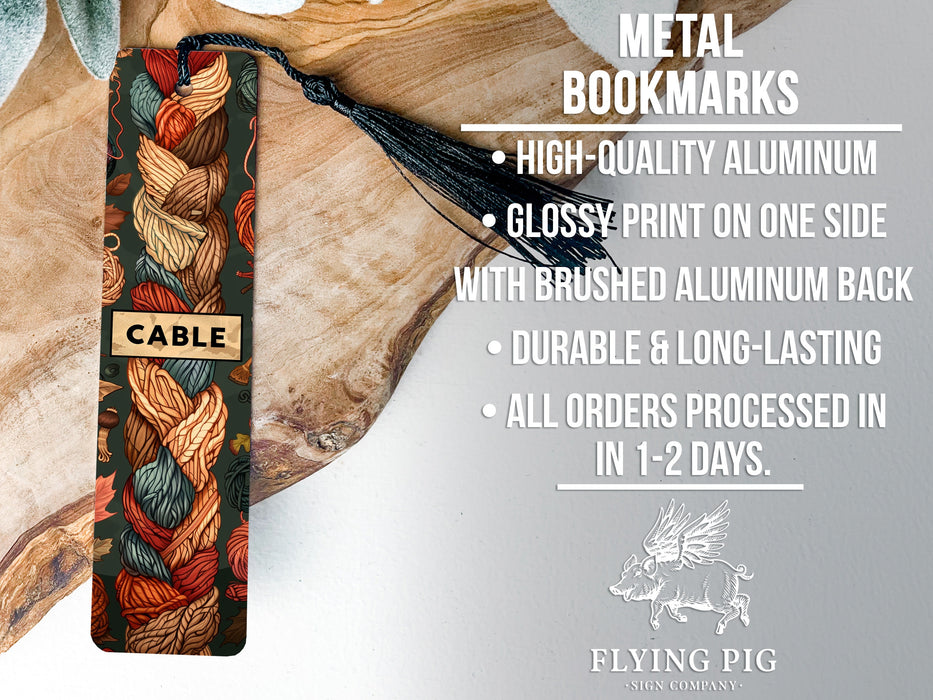 a close up of a bookmark on a piece of wood