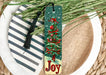 a bookmark with a christmas tree on it