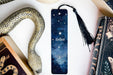 a bookmark, snake, and other items on a table