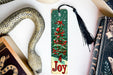 a bookmark with a christmas tree on it