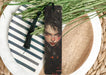 a bookmark with a picture of a woman on it