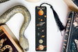 a bookmark with a picture of the solar system