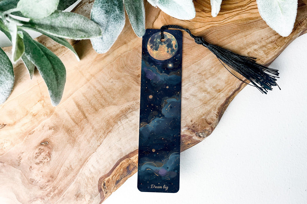 a bookmark sitting on top of a wooden table