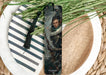 a close up of a bookmark on a plate